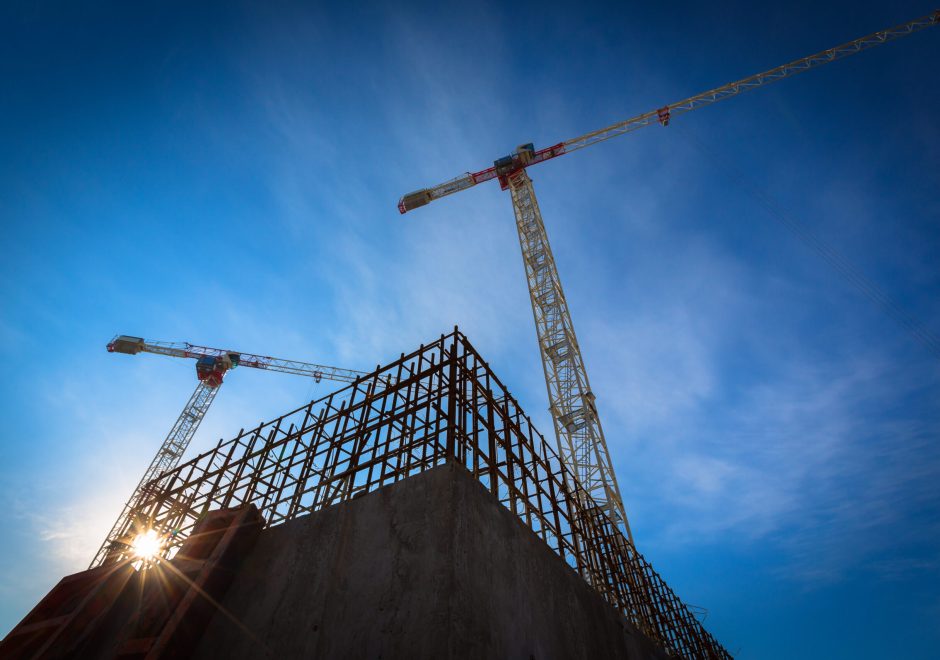 Construction,Site,With,Cranes,On,Sky,Background